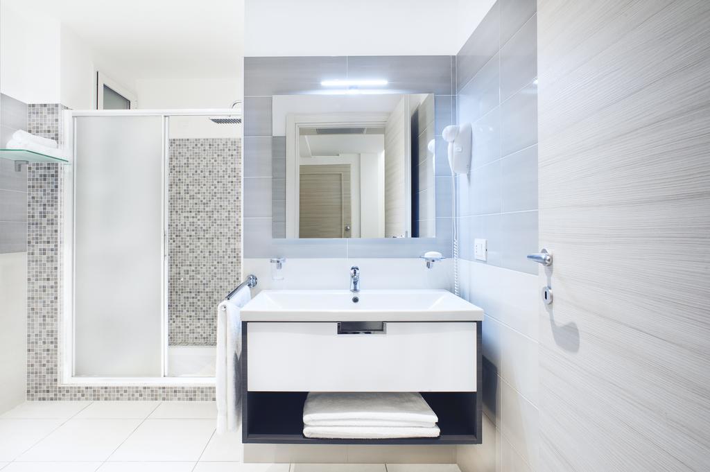 Vuelle Residence Apartments Capo dʼOrlando Szoba fotó